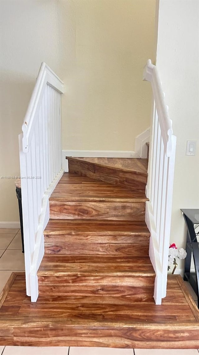 2462 SE 15th Pl Unit 339, Homestead, FL 33035 - stairway featuring tile patterned flooring