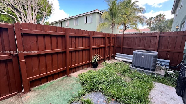 2462 SE 15th Pl Unit 339, Homestead, FL 33035 - fenced backyard featuring cooling unit