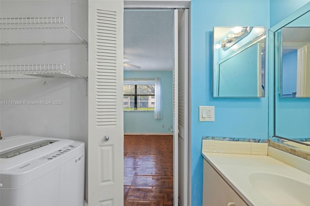 interior space with washer / dryer and a sink