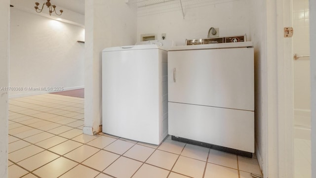 washroom with laundry area and washing machine and clothes dryer