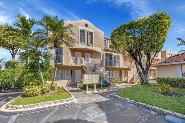 8585 NW 6th Ln Unit 9-208, Miami, FL 33126 - view of property with stairs
