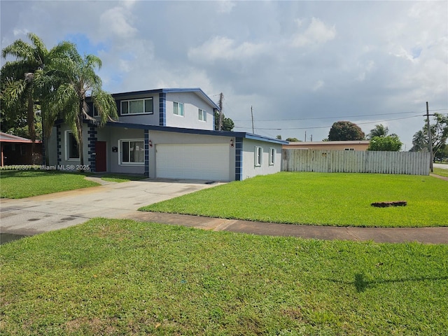 view of front of home with fence, driveway, stucco siding, a front lawn, and a garage