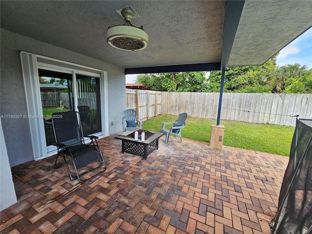 view of patio featuring a fenced backyard