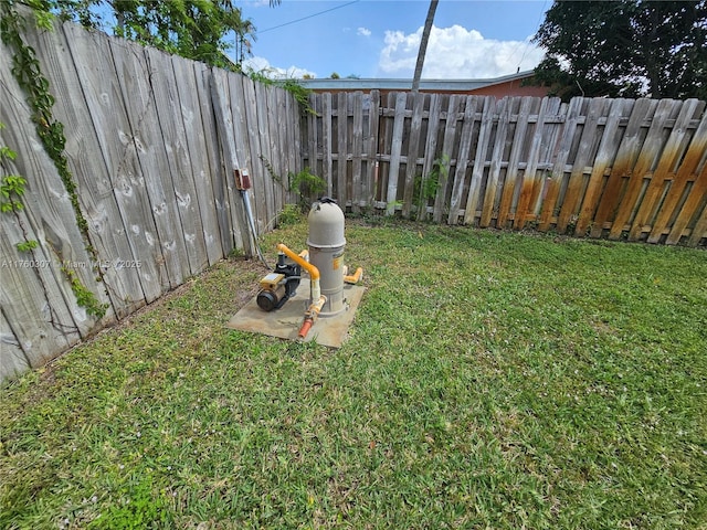 view of yard with a fenced backyard