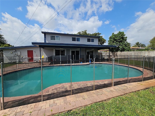 view of pool with fence and a fenced in pool