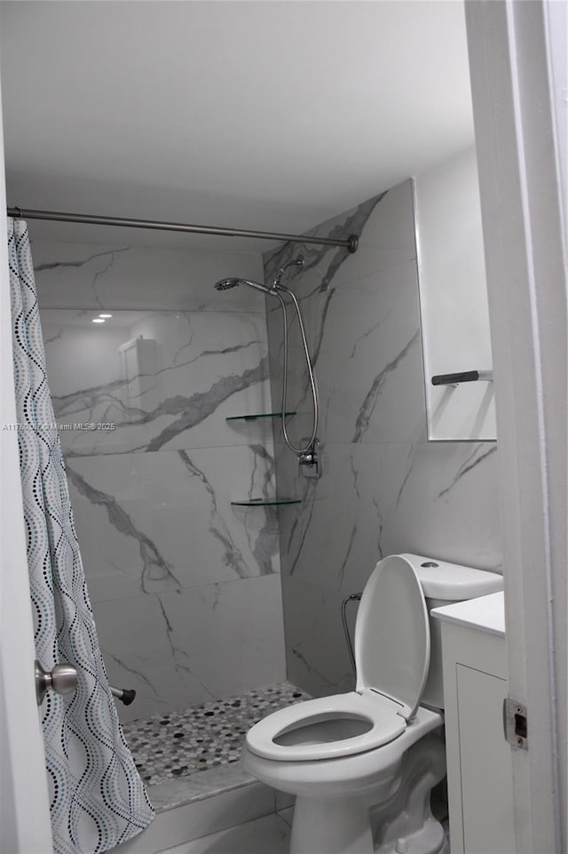 full bathroom with a marble finish shower, toilet, vanity, and tile walls