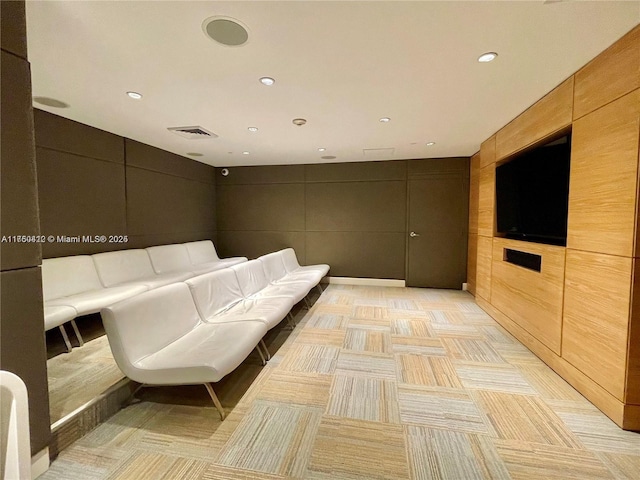 cinema room featuring recessed lighting and visible vents