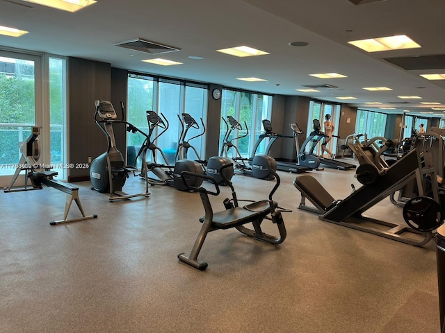 workout area with visible vents and expansive windows