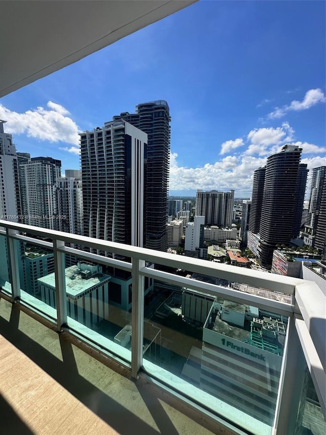 balcony featuring a view of city