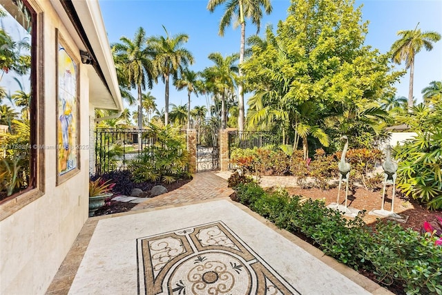 1134 Van Buren St, Hollywood, FL 33019 - view of patio / terrace with a gate and fence