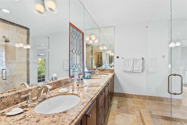 1134 Van Buren St, Hollywood, FL 33019 - bathroom featuring double vanity, recessed lighting, a stall shower, and a sink