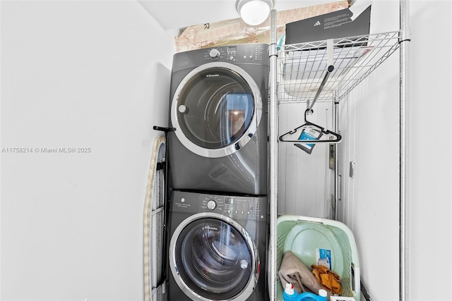 1134 Van Buren St, Hollywood, FL 33019 - clothes washing area featuring stacked washer and dryer and laundry area