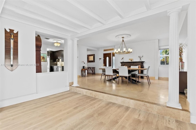 1134 Van Buren St, Hollywood, FL 33019 - dining space featuring baseboards, ornate columns, beam ceiling, a notable chandelier, and light wood-type flooring