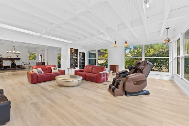 1134 Van Buren St, Hollywood, FL 33019 - living area featuring beam ceiling, a notable chandelier, built in features, coffered ceiling, and wood finished floors