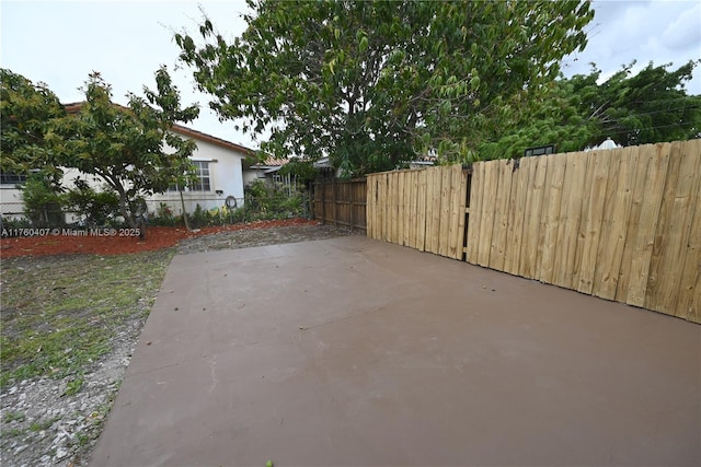 view of patio / terrace with fence