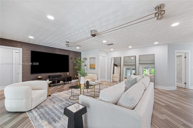 8234 SW 60th Ct, South Miami, FL 33143 - living room with recessed lighting and light wood-style flooring