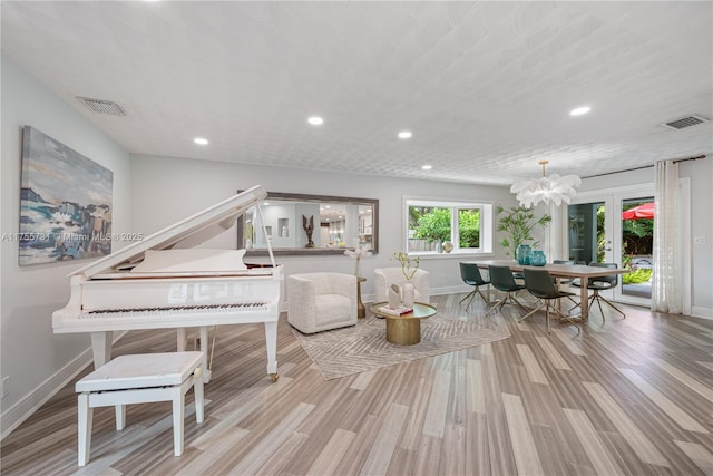 8234 SW 60th Ct, South Miami, FL 33143 - living area featuring recessed lighting, a chandelier, and wood finished floors