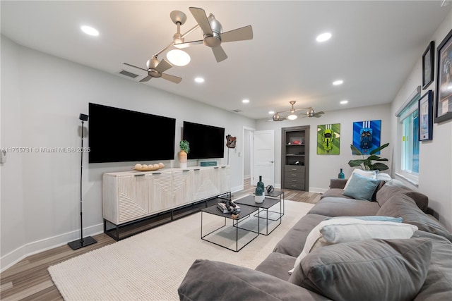 8234 SW 60th Ct, South Miami, FL 33143 - living room with ceiling fan, light wood-style floors, and recessed lighting
