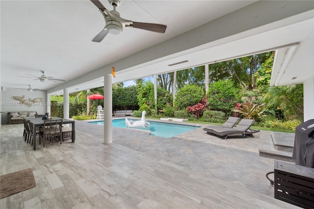 8234 SW 60th Ct, South Miami, FL 33143 - view of swimming pool featuring ceiling fan, outdoor dining area, a patio, and an outdoor hangout area
