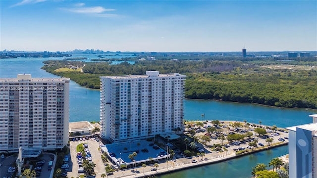 aerial view featuring a city view and a water view