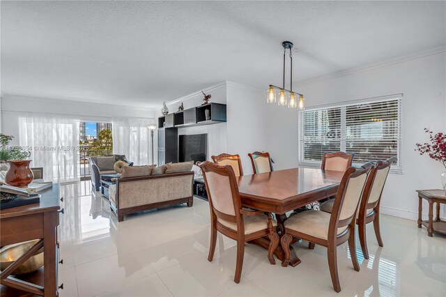 dining space with crown molding