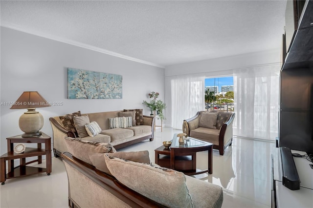 500 Bayview Dr Unit 231, Sunny Isles Beach, FL 33160 - living area featuring a textured ceiling, ornamental molding, and light tile patterned flooring