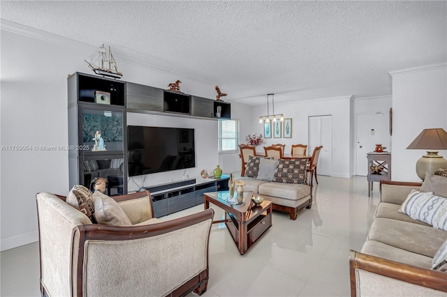 living area featuring a textured ceiling, crown molding, and a chandelier