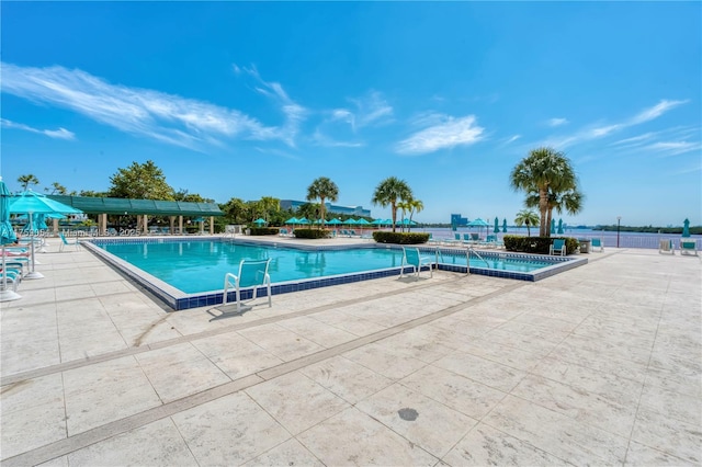 community pool featuring a patio area