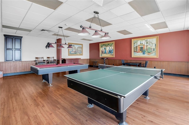 500 Bayview Dr Unit 231, Sunny Isles Beach, FL 33160 - recreation room with billiards table, a wainscoted wall, a drop ceiling, wood finished floors, and wood walls