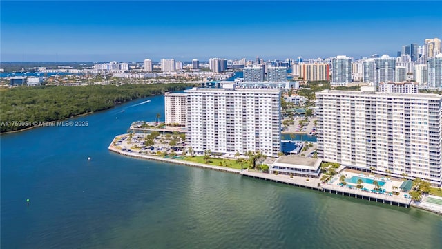 drone / aerial view with a view of city and a water view