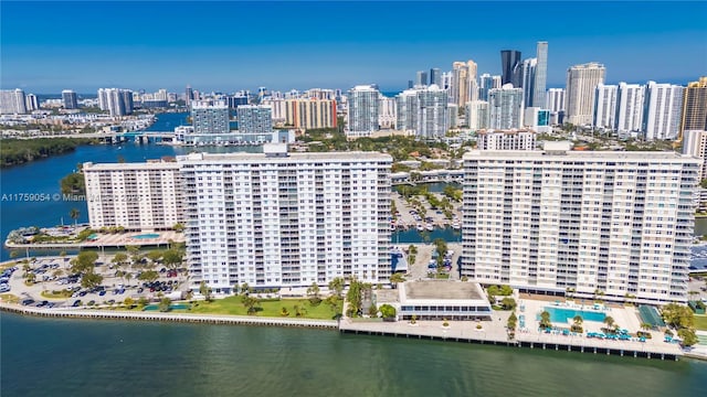 aerial view featuring a water view and a city view