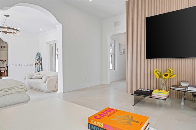 tiled living room featuring visible vents, recessed lighting, arched walkways, baseboards, and a chandelier