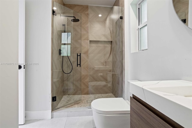 bathroom featuring vanity, toilet, and a shower stall