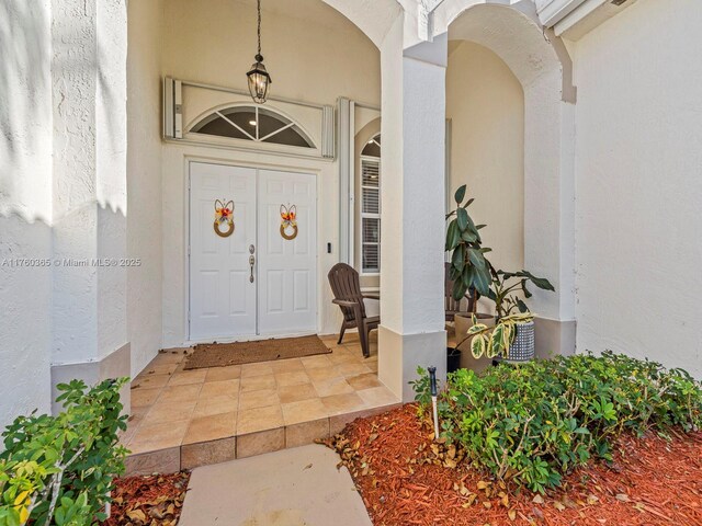 2430 SE 5th Ct, Homestead, FL 33033 - doorway to property featuring stucco siding