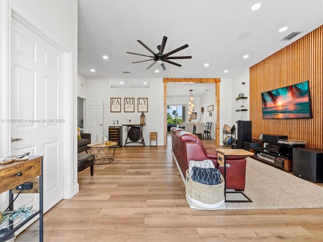 2430 SE 5th Ct, Homestead, FL 33033 - living area featuring ceiling fan, recessed lighting, light wood-type flooring, and beverage cooler