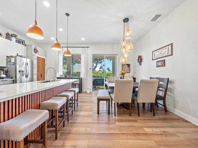 2430 SE 5th Ct, Homestead, FL 33033 - dining room with light wood-style floors and recessed lighting