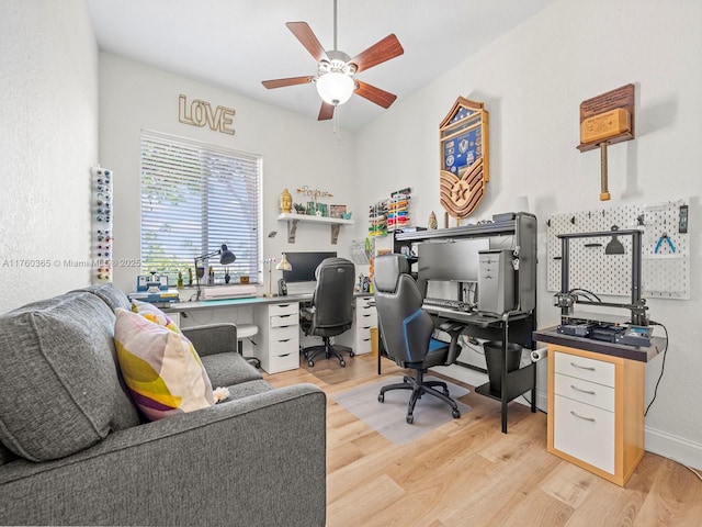 office area featuring a ceiling fan and wood finished floors