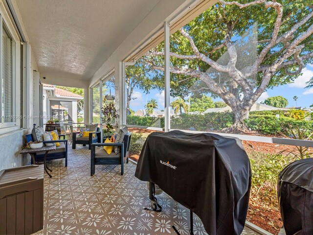 2430 SE 5th Ct, Homestead, FL 33033 - sunroom / solarium with a textured ceiling