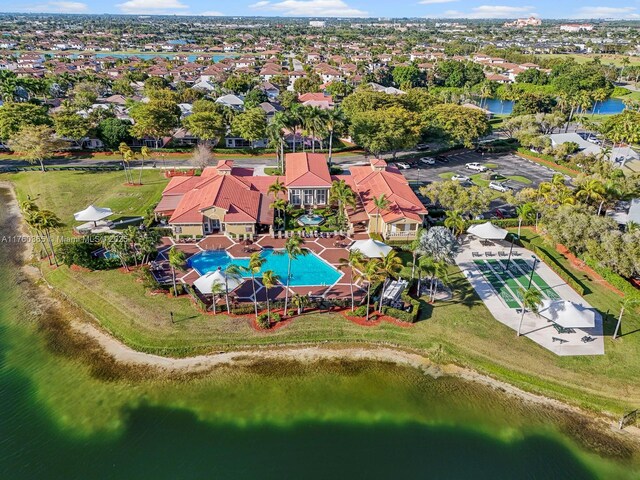 2430 SE 5th Ct, Homestead, FL 33033 - aerial perspective of suburban area with a large body of water and a pool