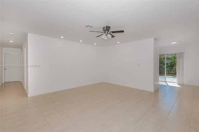 unfurnished room featuring recessed lighting, a ceiling fan, visible vents, and baseboards