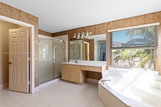 bathroom with tile patterned floors, a garden tub, a stall shower, and vanity