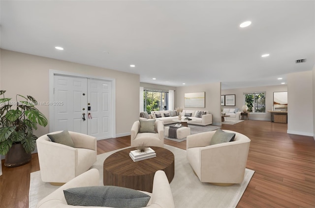 9720 Biscayne Blvd, Miami Shores, FL 33138 - living area with wood finished floors, recessed lighting, and baseboards