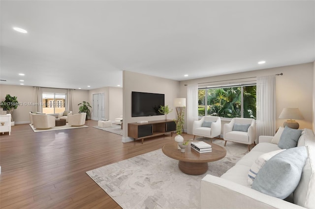 9720 Biscayne Blvd, Miami Shores, FL 33138 - living area featuring wood finished floors, recessed lighting, and baseboards