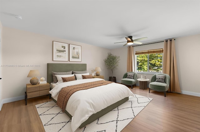 9720 Biscayne Blvd, Miami Shores, FL 33138 - bedroom with baseboards, light wood-type flooring, and ceiling fan