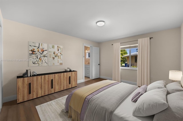 9720 Biscayne Blvd, Miami Shores, FL 33138 - bedroom featuring dark wood-type flooring, baseboards, and ensuite bathroom