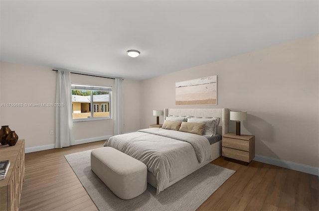9720 Biscayne Blvd, Miami Shores, FL 33138 - bedroom with wood finished floors and baseboards
