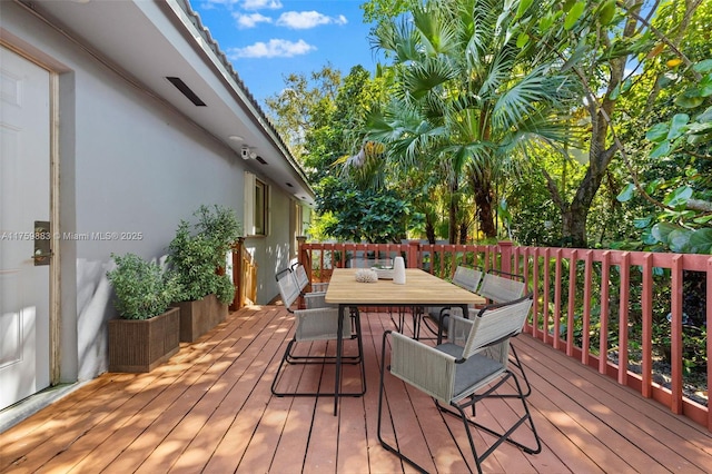 9720 Biscayne Blvd, Miami Shores, FL 33138 - wooden deck featuring outdoor dining space