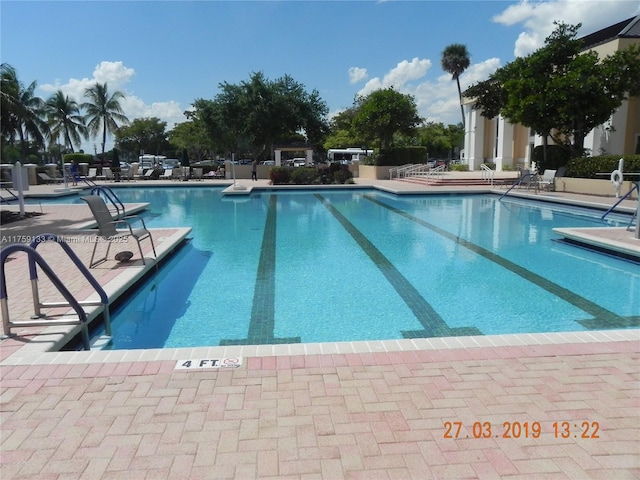 pool with a patio