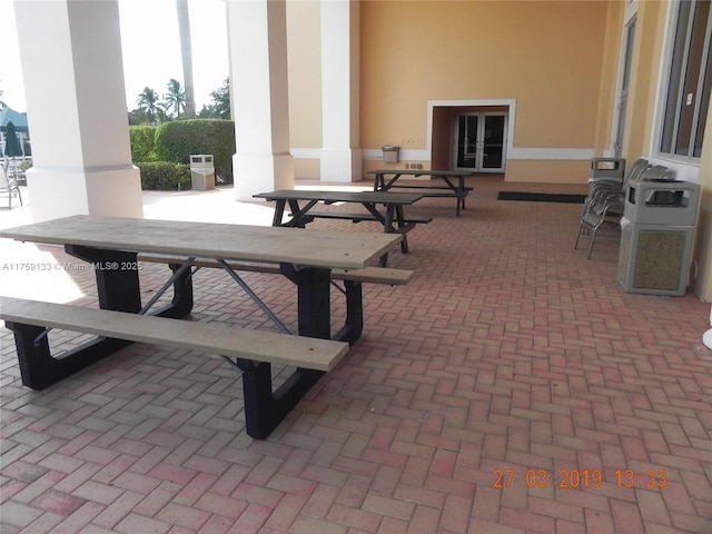 view of patio featuring outdoor dining space and french doors