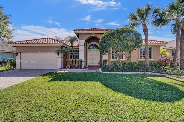 mediterranean / spanish-style home with stucco siding, decorative driveway, a front lawn, and an attached garage